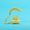 Banana phone with yellow vintage telephone on blue pastel color background.