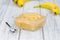 Banana Puree on wooden background