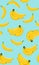 Banana seamless pattern, Bunch of ripe bananas on a blue background.