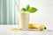 banana smoothie with oats seeds in glass