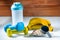 Banana Whey Protein Powder With Shacker and Two Dumbells