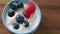 Banana and yogurt raspberry blueberry fruit salad. Healthy eating.