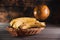 Bananas in a basket on a wooden brown natural background near a brown globe