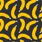 Bananas doodle seamless pattern with bright scattered.