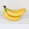 Bananas fruit square fruits on wooden board