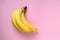 Bananas on pink background. Minimal style. Flat lay.