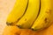 Bananas with yute texture in the background
