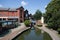 Banbury Canal and lock with views of Castle Quay Shopping Centre in North Oxfordshire, UK