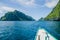 Banca Boat approaching Mantiloc Island on Windy Day, El, Nido, Palawan Philippines