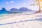 Banca boat on Ipil beach in evening sunlight on Inabuyatan Island, El Nido, Palawan, Philippines