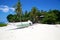 Banca boat on white sand tropical beach on Malapascua island, Philippines