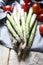 Banches of fresh green asparagus on wooden background