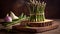 banches of fresh green asparagus on wooden background, top view