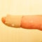 Band aid plaster of cloth wrapped in an injured thumb