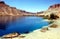 Band-e Amir Lakes, Afghanistan: View of a lake and the Hindu Kush mountainsdam from below