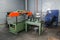 Band saw for industrial high speed cutting metal pipe and using coolant. Hack sawing machine working to cutting metal