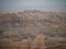 Banded or Striated Mountains in Badlands National Park in South Dakota with Smoky Skies Above