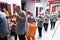 Bandung, Indonesia - January 8, 2022 : Buddhist People pray together with the monks while giving the offering in front of the