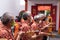 Bandung, Indonesia - January 8, 2022 : The man united together for brings the offering to the monks and god on the altar while