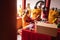 Bandung, Indonesia - January 8, 2022 : The Monks with orange clothes pray together in front of the altar