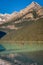 Banff, Canada - Ago 19th 2017 - Tourists doing kayak and enjoying the amazing scenario of lake Moraine, early morning light, glaci