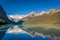 Banff, Canada - Ago 19th 2017 - Tourists doing kayak and enjoying the amazing scenario of lake Moraine, early morning light, glaci