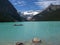 Banff National Park, Canadian Rockies, Red Canoe on Glacial Lake Louise, Alberta, Canada