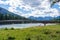 Banff Pedestrian Bridge and Bow River trail in summer sunny day. Banff National Park, Canadian Rockies