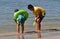 Bang Saen, Thailand: Thai Boys Playing in Sea
