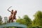 Bangalore, India, June 4, 2019 : Sculpture of queen Kittur Rani Chennamma on horse with sword at Bengaluru, Karnataka, India