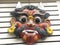 Bangalore, Karnataka, India - April 16 2018 Colorful Demon face of Drishti Bommai talisman