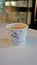 Bangalore,Karnataka,India-October 26 2022: Tea or Chai Served in paper cup in Indian trains and railway station with logo of IRCTC