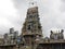 Bangalore, Karnataka, India - Sep 5, 2009 Colorful gopuram of the temple with white, black, dark clouds