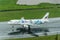 Bangkok airways landing at Phuket airport wet runway