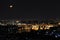 Bangkok city on a night and the moon orbits the nearest world