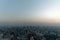 Bangkok city skyline at melacholic lonely misty sunset view from Baiyok ii Tower