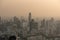 Bangkok city skyline at melacholic lonely misty sunset view from Baiyok ii Tower