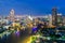 Bangkok skyline along Chao Phraya river at night in Bangkok