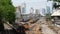 BANGKOK, THAILAND - 11 JULY, 2019: View of the train station against the backdrop of the cityscape and skyscrapers. Hua