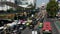 Bangkok, Thailand - 18 December, 2018: Cars on busy city street. Many modern cars and buses riding on busy street on
