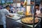 Bangkok,Thailand , 2020 november 11 : Merchants are frying patongo while there are many customers lining up to buy it.