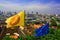 Bangkok Thailand 5th September 2008 View on on the city of Bangkok with The Dharmacakra flag Buddhism - orange and Flag