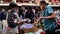 Bangkok, Thailand - April 22, 2020 : Crowd of Thai people choosing face mask at street vendor during the covid-19 virus outbreak