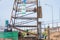 Bangkok, Thailand - April, 24, 2021 : A worker on drilling rig derrick platform structure with blue sky background. Heavy