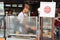 Bangkok, Thailand - April 30, 2018 Michelin star symbol on lebel. This man show how to grill Deep-fried dough stick that call