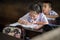 BANGKOK THAILAND - August 23, 2017 : The student girl is studying very concentrate. She do homework in the classroom at Wannawit S