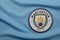 BANGKOK, THAILAND - AUGUST 5: The Logo of Manchester City Football Club on the Jersey on August 5,2017 in Bangkok Thailand.