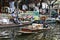 Bangkok Thailand. Boats on the canal selling fruits, foods for tourists in Damnoen Saduak floating market.