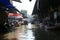 Bangkok Thailand. Boats on the canal selling fruits, foods for tourists in Damnoen Saduak floating market.