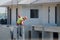 Bangkok, Thailand-December 25, 2018: Construction worker are installing Crane hooks at the precast concrete wall.